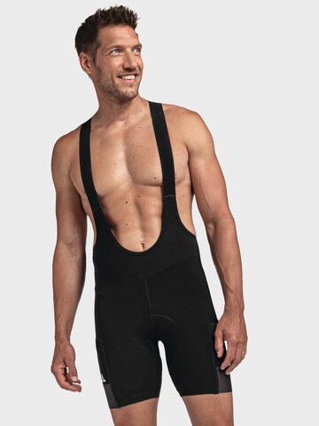 Schöffel Skinny Outdoor trousers 'Solo Bib' in Black: front