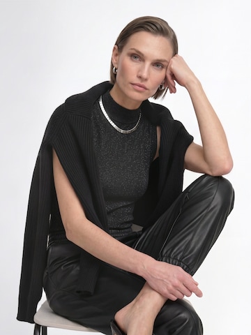 juoda Rich & Royal Laisvas Kelnės