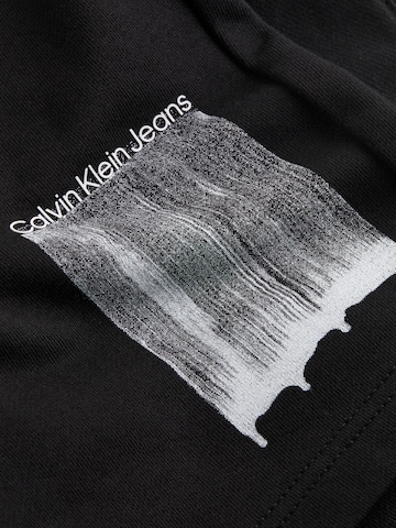 Calvin Klein Jeans Regularen Hlače | črna barva