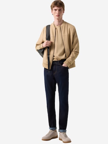 BOGNER Slimfit Jeans 'Rob' in Braun