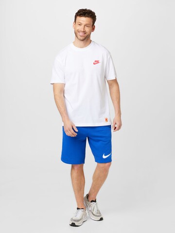 Regular Pantaloni de la Nike Sportswear pe albastru