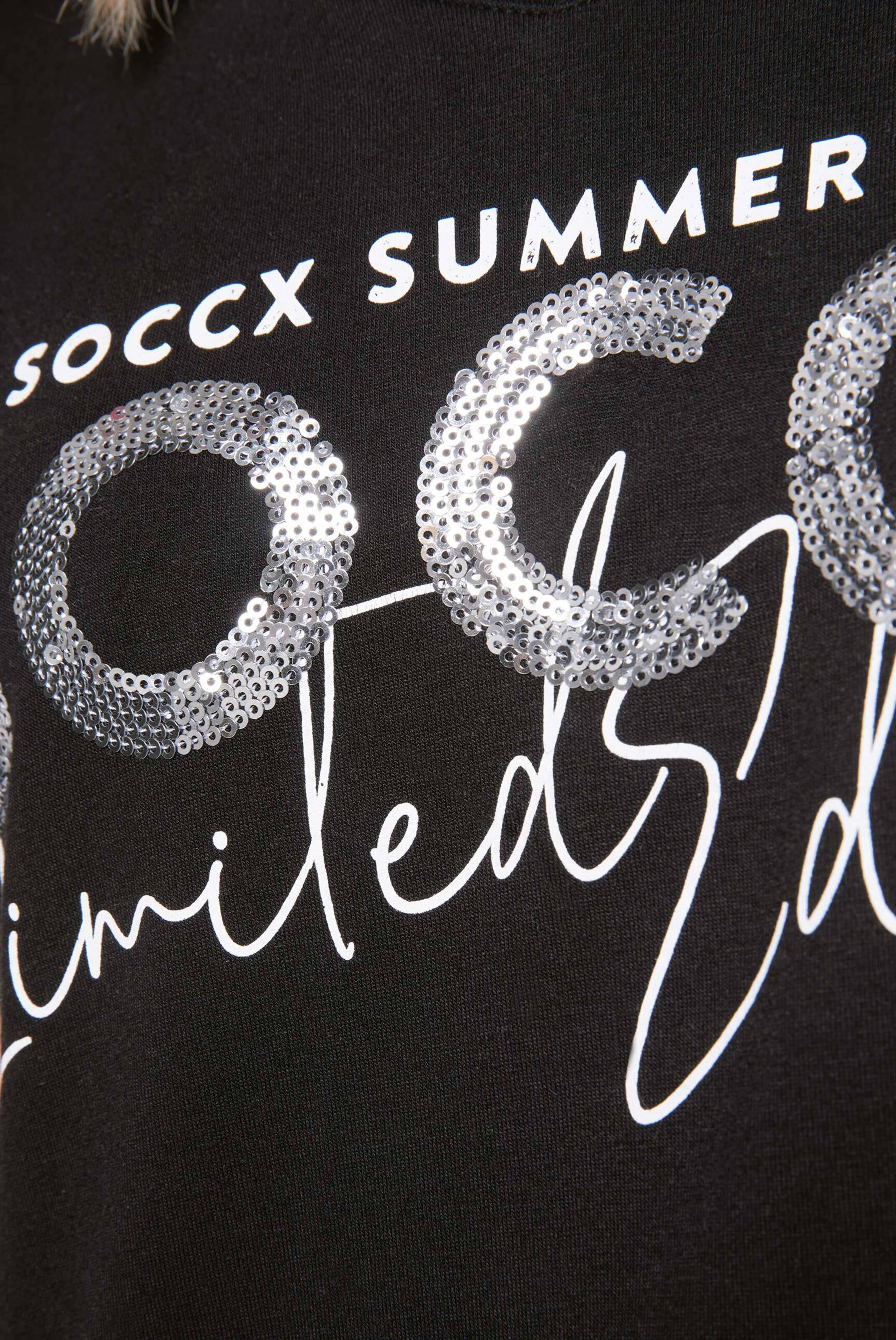 Frauen Shirts & Tops Soccx T-Shirt mit V-Ausschnitt und Flitter-Logo in Schwarz - NN24679