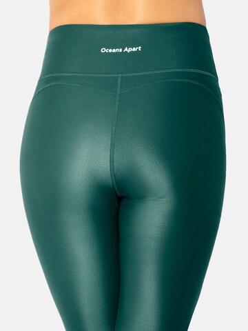 OCEANSAPART - Skinny Leggings 'Cosmic' em verde