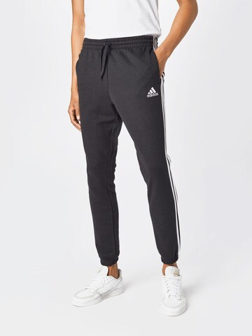 ADIDAS SPORTSWEAR Tapered Workout Pants 'Essentials French Terry Tapered 3-Stripes' in Black: front