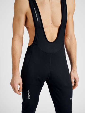 Newline Slim fit Sports trousers in Black