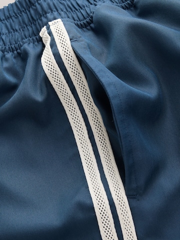 self. - Pierna ancha Pantalón en azul