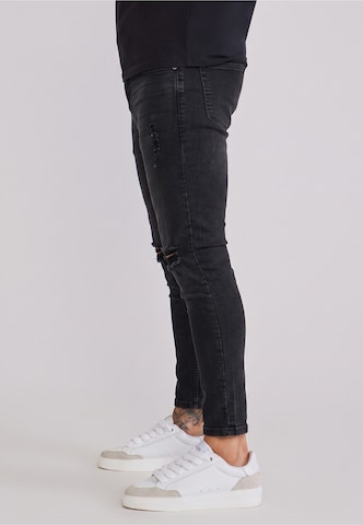 Slimfit Jeans di SikSilk in nero