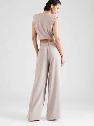 ABOUT YOU x Iconic by Tatiana Kucharova Loose fit Pleat-Front Pants 'Mathilda' in Beige