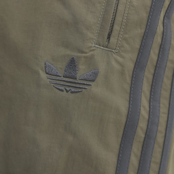 ADIDAS ORIGINALS Tapered Broek 'Firebird' in Bruin