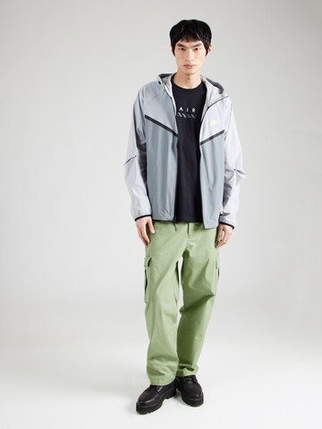 Nike Sportswear Přechodná bunda – šedá