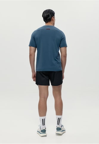 T-Shirt fonctionnel 'Volta' Born Living Yoga en bleu