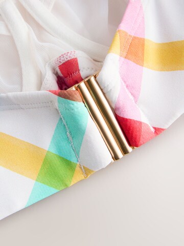 Next Сутиен със смаляващ ефект Горнище на бански в бяло