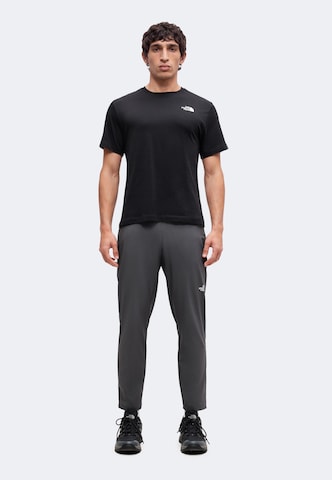 Maglietta 'TESTED AND PROVEN' di THE NORTH FACE in nero