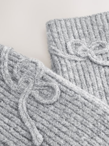 Next Stulpen in Grau