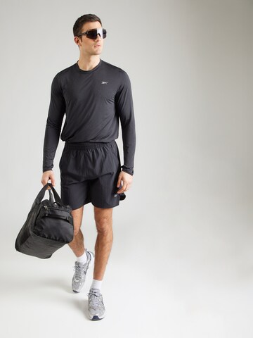 Regular Pantalon de sport Reebok en noir