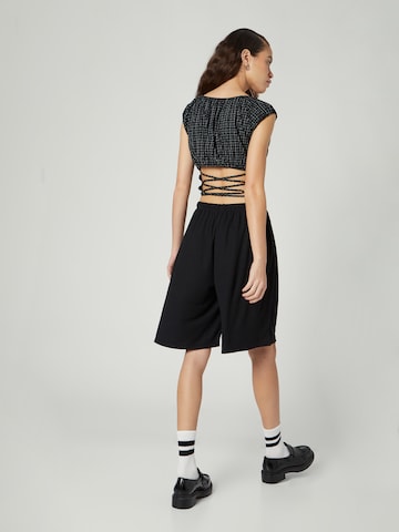 Bella x ABOUT YOU Wide leg Pants 'Robin' in Black