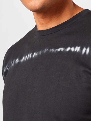 Maglietta 'Dandada' di Cleptomanicx in nero