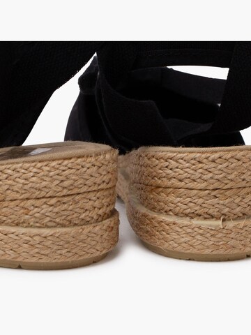 Pisamonas - Sandalias en negro