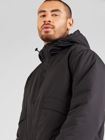 ABOUT YOU Between-Season Jacket 'Jannek' in Black