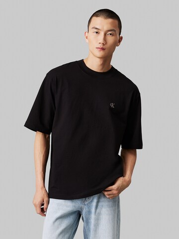 T-Shirt Calvin Klein Jeans en noir : devant