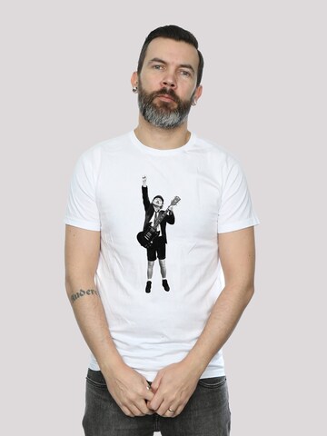 T-Shirt 'ACDC Angus Young Cut Out' F4NT4STIC en blanc : devant