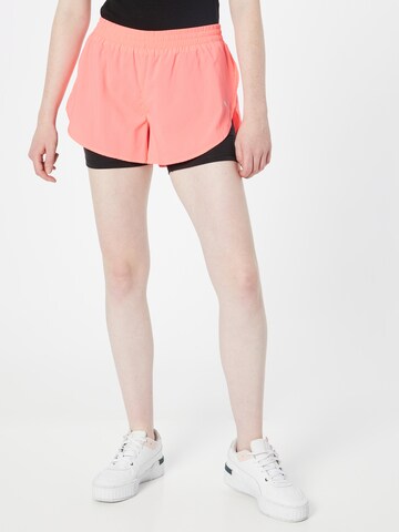 PUMA Skinny Sports trousers in Pink: front