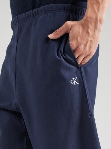 Calvin Klein Jeans Дънки Tapered Leg Панталон в синьо