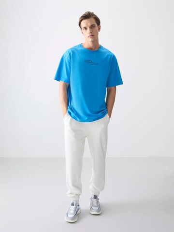 Tommy Life T-Shirts in Blau