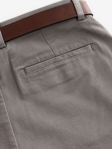 Slimfit Pantaloni chino di Next in grigio