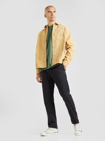 Tapered Pantaloni eleganți de la BOSS pe negru