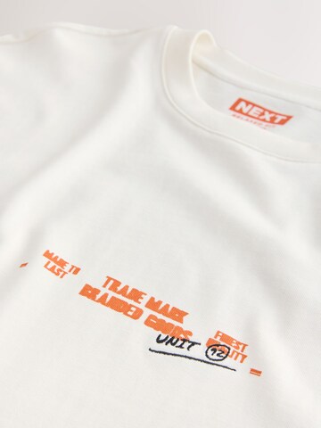 T-Shirt Next en blanc