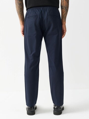 Next Ohlapna forma Chino hlače | modra barva