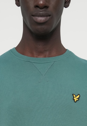 Bluză de molton de la Lyle & Scott pe verde