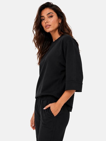 REGINA FASHION Trenirka za tek 'Elegant Tracksuit' | črna barva