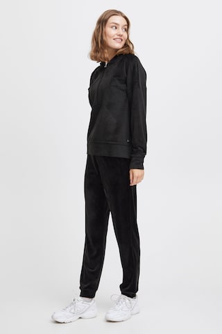 Oxmo Sweatsuit in Black: front