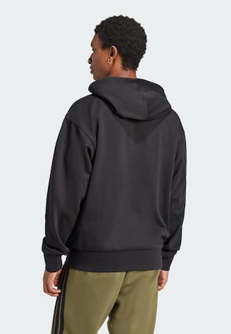 ADIDAS SPORTSWEAR Sports sweatshirt 'Feelcozy' in Black