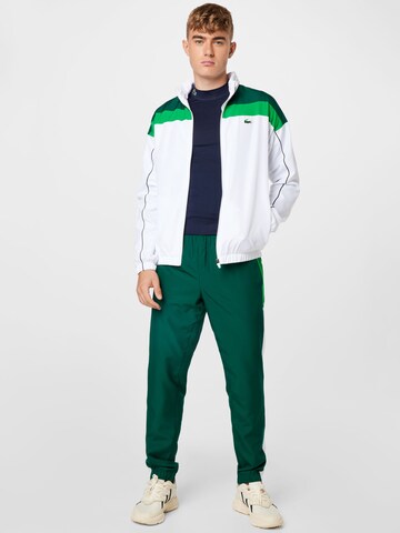 Costum de trening de la Lacoste Sport pe verde