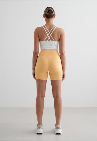 Aim'n Skinny Sportbroek 'Sense' in Oranje