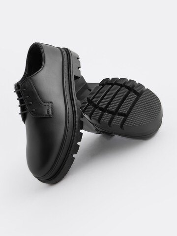 Next Flats in Black