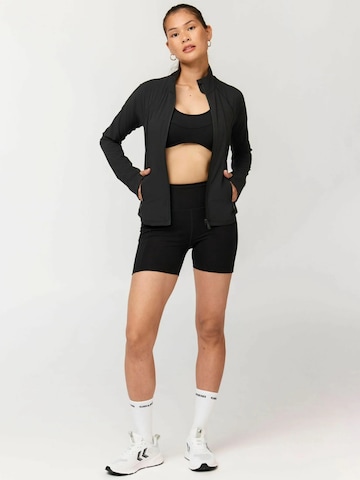 Girlfriend Collective Urheilutakki ' Estrella ' värissä musta