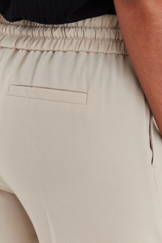 Loosefit Pantalon à plis b.young en beige