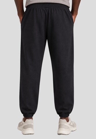 UMBRO - Tapered Pantalón en gris