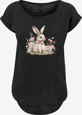 T-shirt 'Niedlicher Osterhase mit Blumen' F4NT4STIC en noir : devant