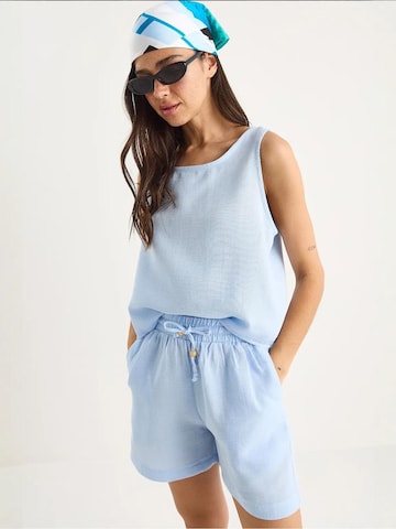 Pantalons de tailleur Bianco Lucci en bleu