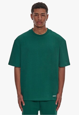 Dropsize T-shirt i grön: framsida
