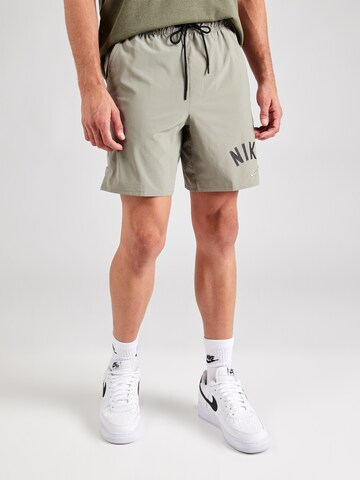 regular Pantaloni sportivi 'UNLMTD SWOOSH' di NIKE in grigio: frontale