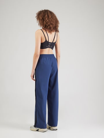 mėlyna NIKE Plačios klešnės Sportinės kelnės