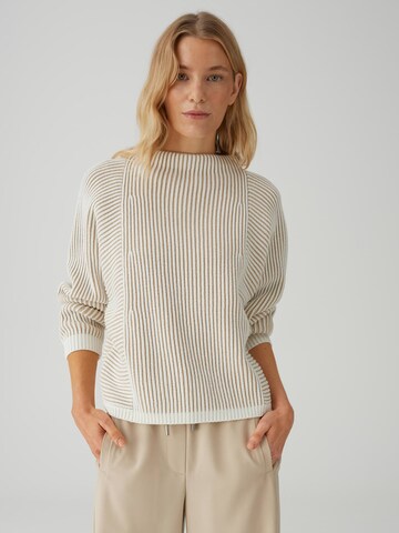 Pulover 'Pozoli' de la OPUS pe bej: față