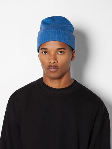 Bershka Beanie in Blue: front