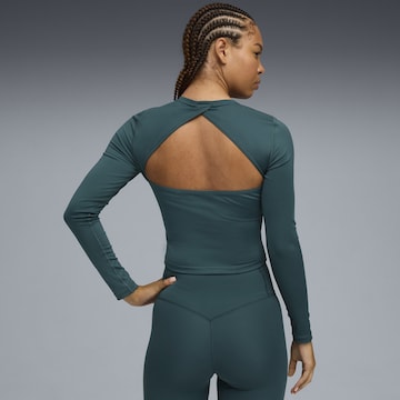 PUMA Functioneel shirt 'GREEN TERRAINS' in Groen